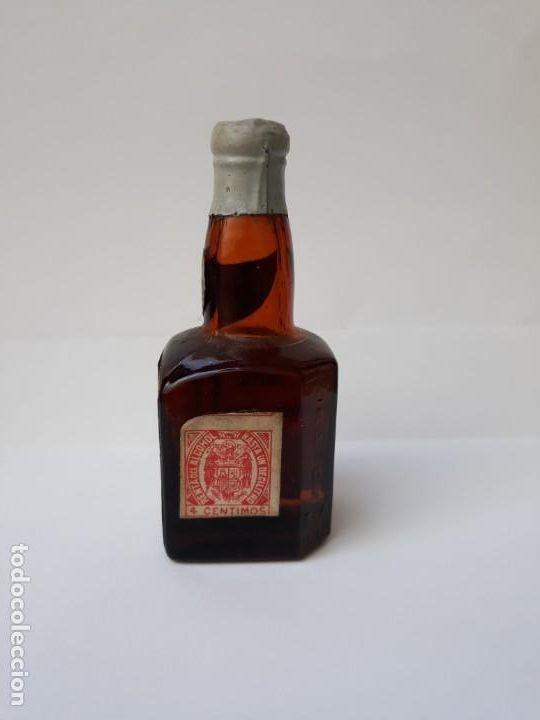 Coleccionismo de vinos y licores: BOTELLIN LICOR DE NARANJA TRIPLE SECO.LARIOS S.A M&Aacute;LAGA