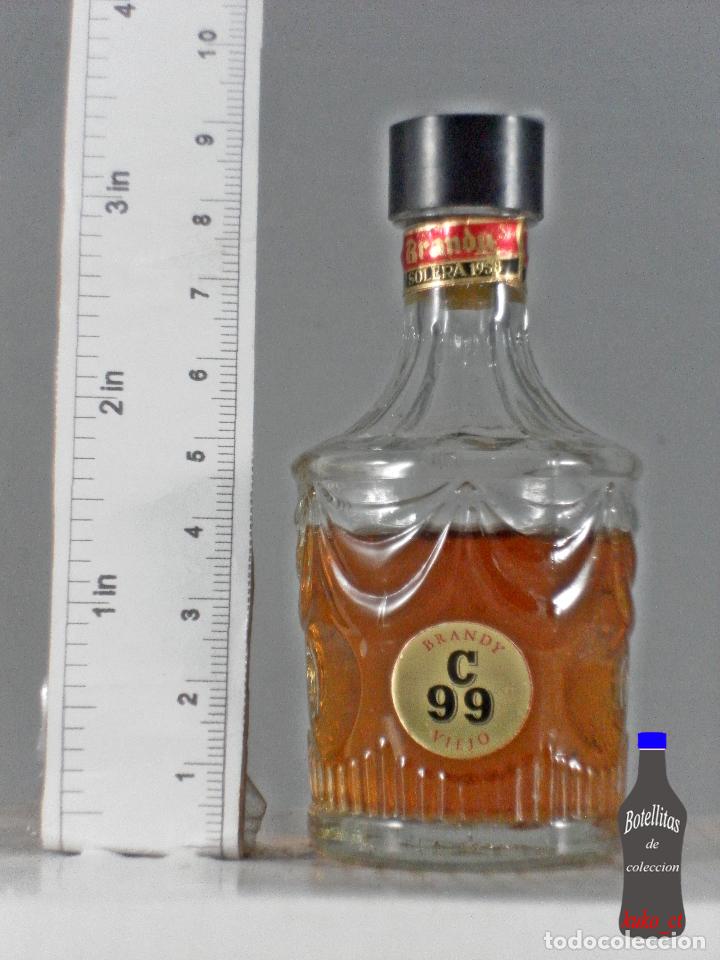 Coleccionismo de vinos y licores: BOTELLITA BOTELLIN BRANDY C99 VIEJO SOLERA 1958
