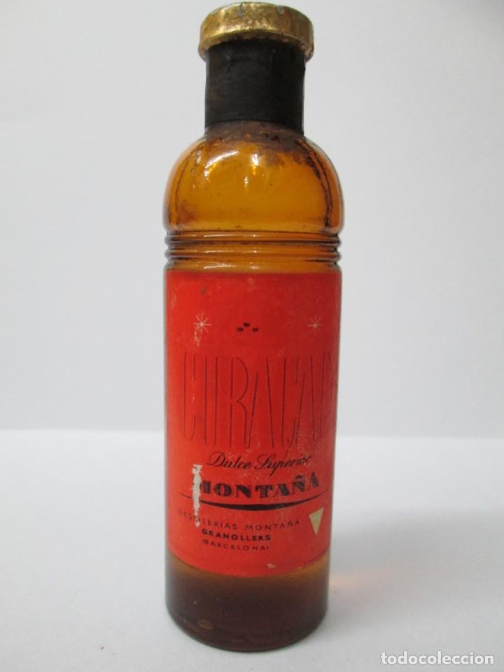 Coleccionismo de vinos y licores: ANTIGUO BOTELLIN BRANDY CO&Ntilde;AC, CURACAO MONTA&Ntilde;A