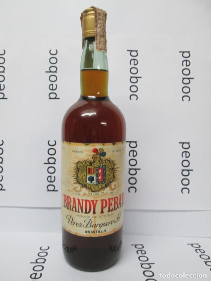 Coleccionismo de vinos y licores: ANTIGUA BOTELLA BRANDY CO&Ntilde;AC,PEBAR, PEREZ BARQUERO, IMPUESTO DE 4 PTS, DECADA 60-70
