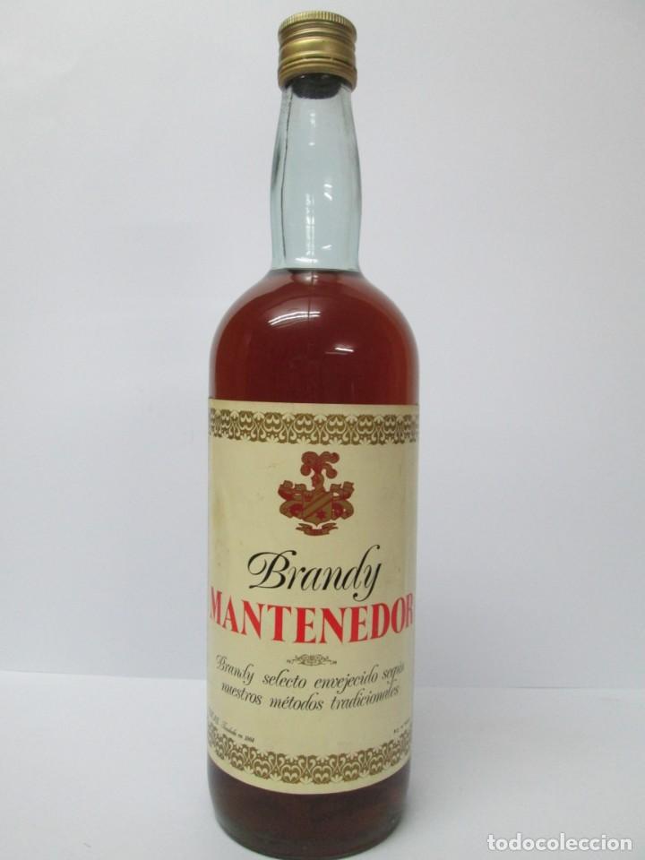 Coleccionismo de vinos y licores: ANTIGUA BOTELLA BRANDY CO&Ntilde;AC, MANTENEDOR, DE IMPUESTO DE 4 PTS, DECADA 60-70