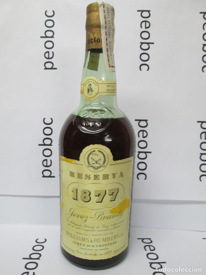 Coleccionismo de vinos y licores: ANTIGUA BOTELLA BRANDY CO&Ntilde;AC, 1877 RESERVA, IMPUESTO DE 4 PTS, DECADA 60-70