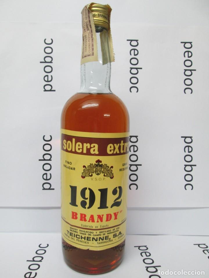 Coleccionismo de vinos y licores: ANTIGUA BOTELLA BRANDY CO&Ntilde;AC, 1912 TEICHENNE, IMPUESTO DE 4 PTS, DECADA 60-70