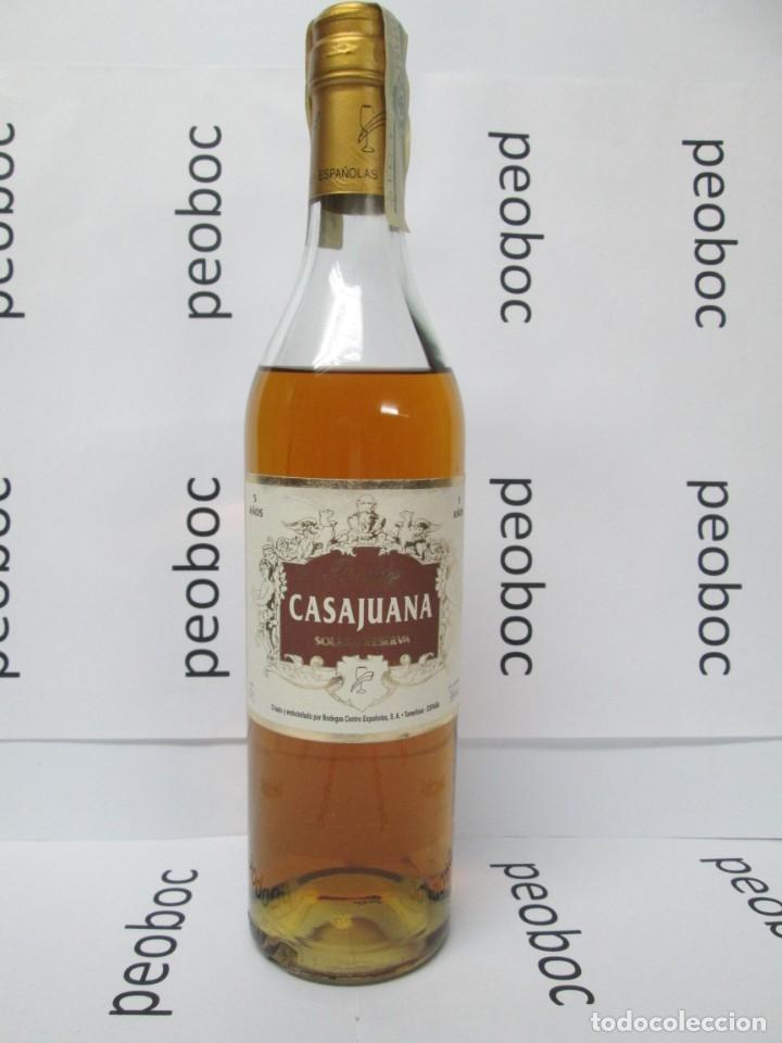Coleccionismo de vinos y licores: ANTIGUA BOTELLA BRANDY CO&Ntilde;AC,CASAJUANA SOLERA RESERVA