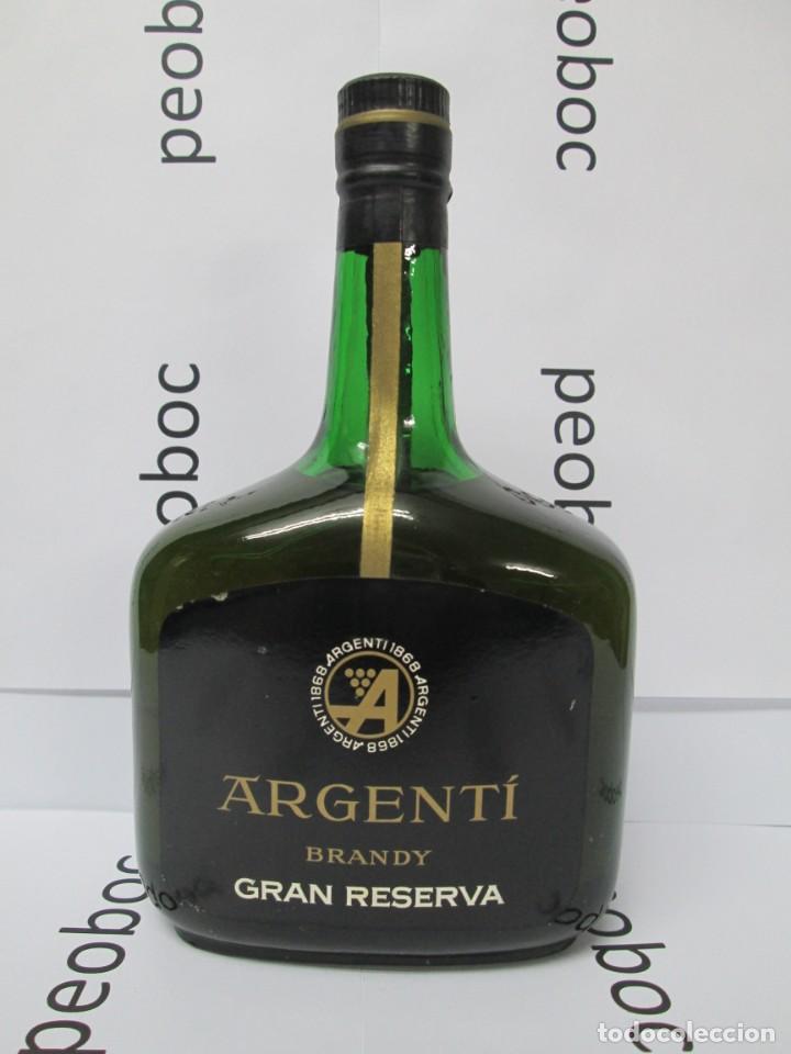 Coleccionismo de vinos y licores: ANTIGUA BOTELLA BRANDY CO&Ntilde;AC, ARGENTI IMPUESTO DE 4 PTS. DECADA 60-70