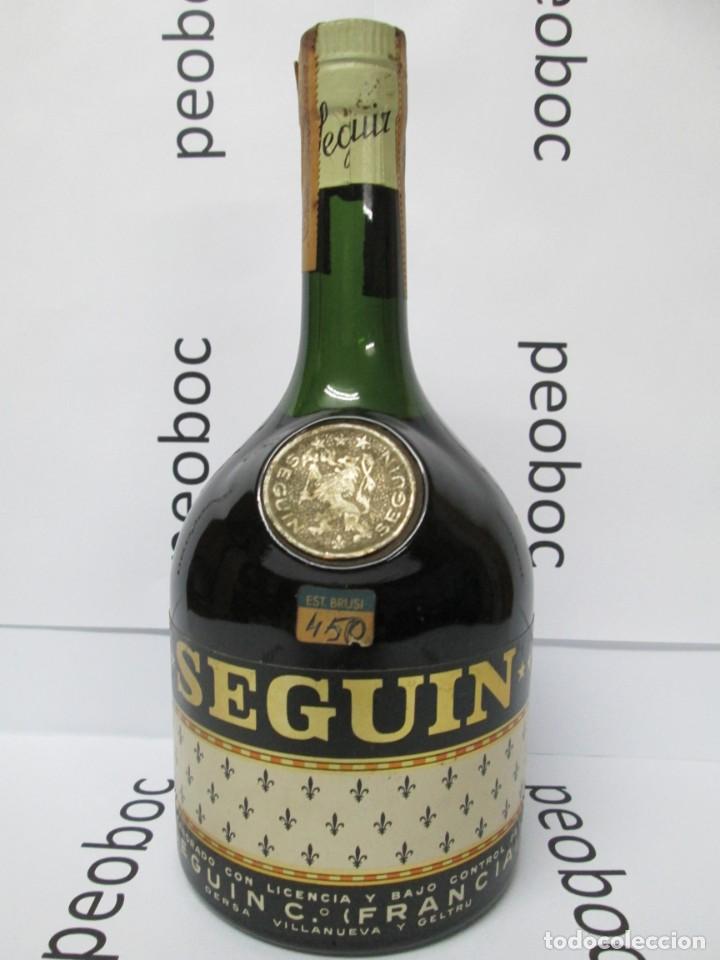 Coleccionismo de vinos y licores: ANTIGUA BOTELLA BRANDY CO&Ntilde;AC, SEGUIN IMPUESTO DE 80 CTS, DECADA 50-60