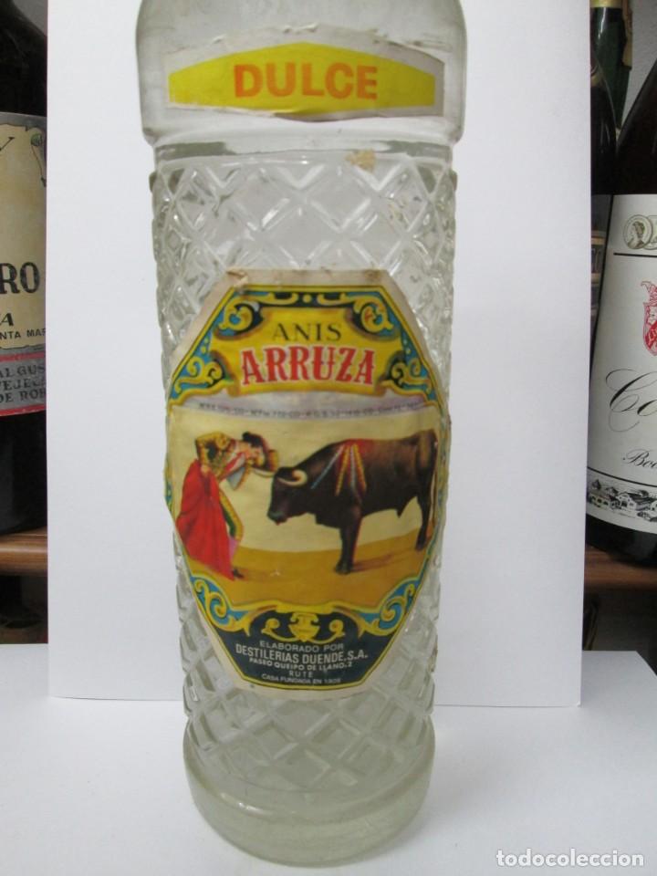 Coleccionismo de vinos y licores: ANTIGUA BOTELLA BRANDY CO&Ntilde;AC, ANIS DULCE ARRUZA