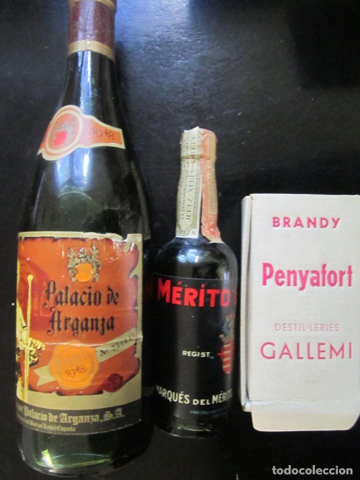 Coleccionismo de vinos y licores: LOTE 3 BOTELLAS SIN ABRIR TINTO PALACIO DE ARGANDA 1948,BRANDY PENYAFORT YMARQUES DE MERITO