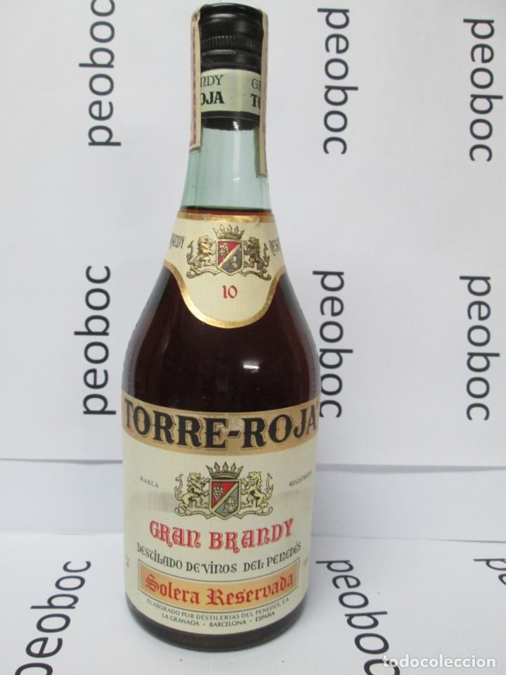 Coleccionismo de vinos y licores: ANTIGUA BOTELLA BRANDY CO&Ntilde;AC, TORRE ROJA DE 10 A&Ntilde;OS, IMPUESTO DE 4 PTS, DECADA 60-70