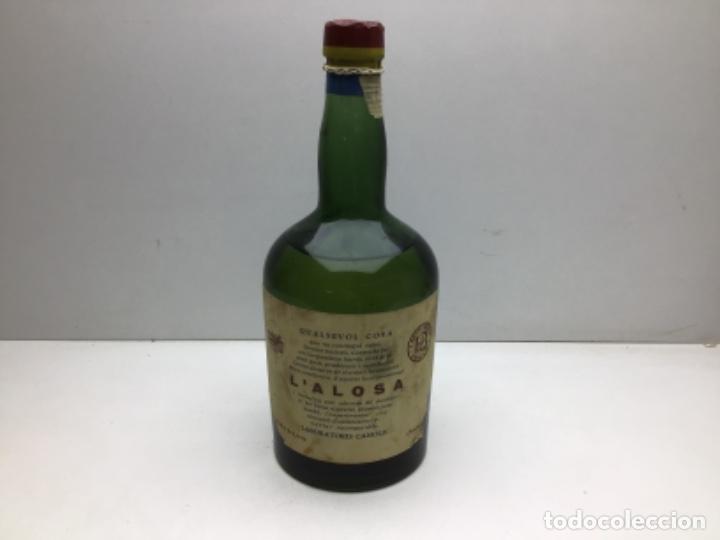 Coleccionismo de vinos y licores: RARISIMA BOTELLA LICOR - QUALSEVOL COSA - L'ALOSA - LABORATORIS CANOLIC -SAN JULIA DE LORIA -ANDORRA