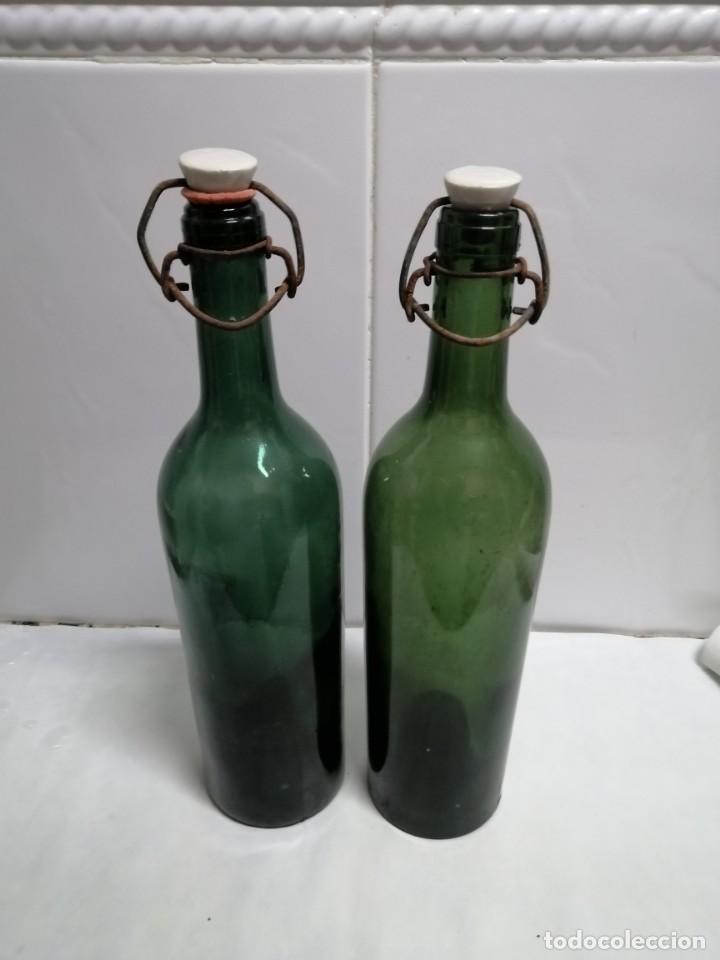 Colecionismo de vinhos e licores: 2 ANTIGUAS BOTELLAS BASE HUNDIDA