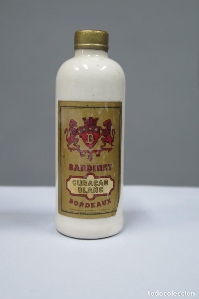 Collection of wines and liquors: BOTELLIN. BARDINET. CURACAO BLANC