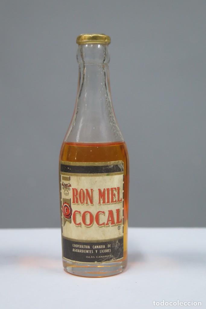 Collection of wines and liquors: BOTELLIN. RON MIEL COCAL
