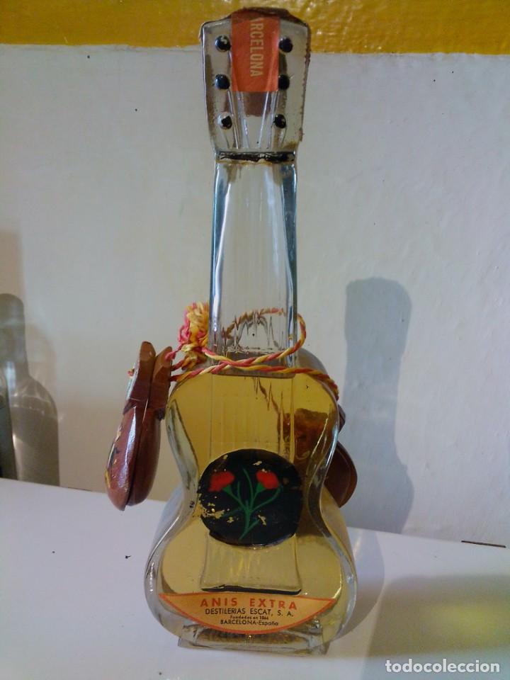 Collection of wines and liquors: Botella an&iacute;s escat