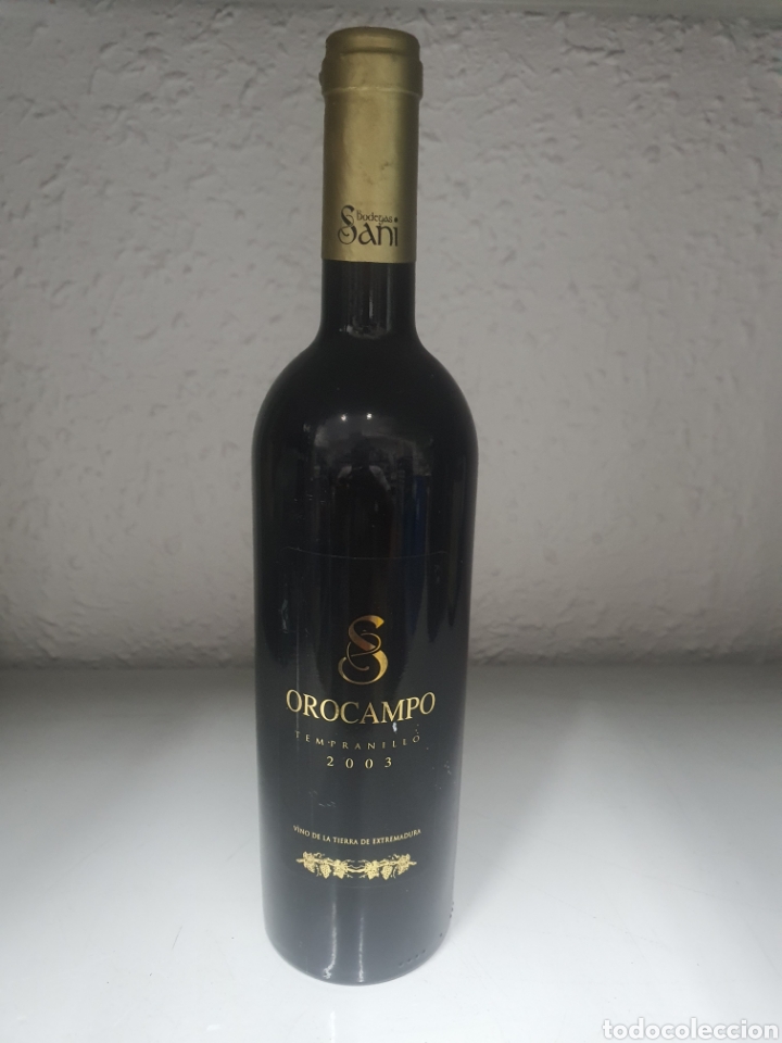 Collection of wines and liquors: botella vino oroblanco tempranillo 2003 bodega sani