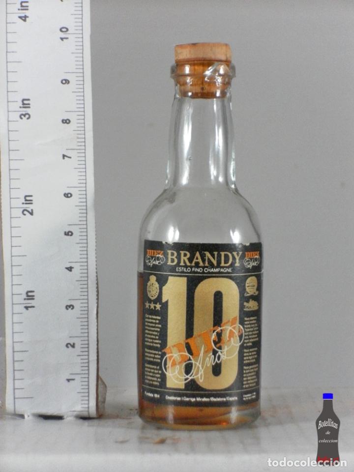 Coleccionismo de vinos y licores: BOTELLITA BOTELLIN BRANDY 10 A&Ntilde;OS ESTILO FINO CHAMPAGNE DESTILERIAS GARRIGA MIRALLES BADALONA