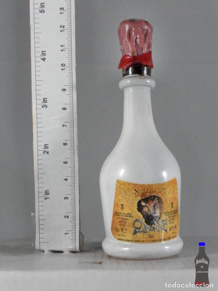 Coleccionismo de vinos y licores: BOTELLITA BOTELLIN BRANDY CONDE DE OSBORNE DALI
