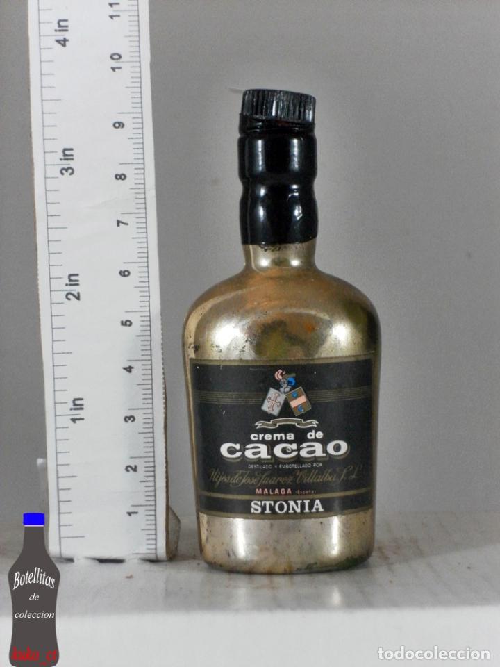 Coleccionismo de vinos y licores: BOTELLITA BOTELLIN LICOR DE CACAO HIJOS DE SUAREZ VILLALBA MALAGA STONIA
