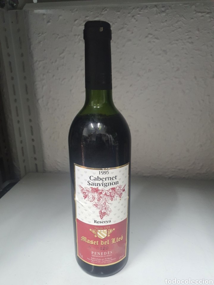 Collection of wines and liquors: Botella vino sauvenet sauvignon gran reserva maset del lleo 1995