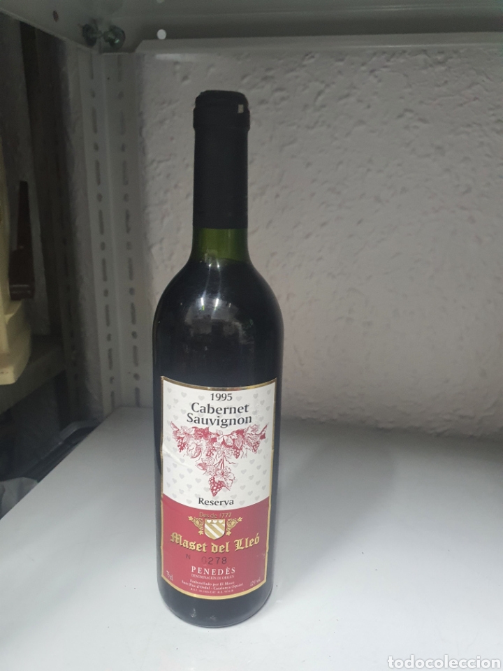 Collection of wines and liquors: Botella vino sauvenet sauvignon gran reserva maset del lleo 1995