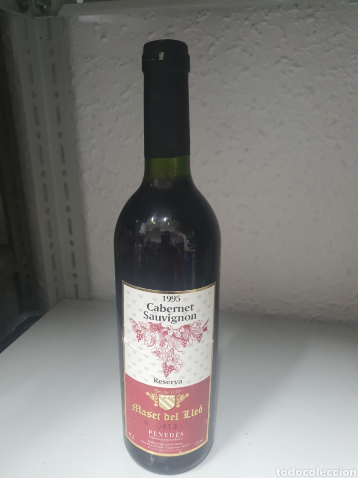 Collection of wines and liquors: Botella vino sauvenet sauvignon gran reserva maset del lleo 1995
