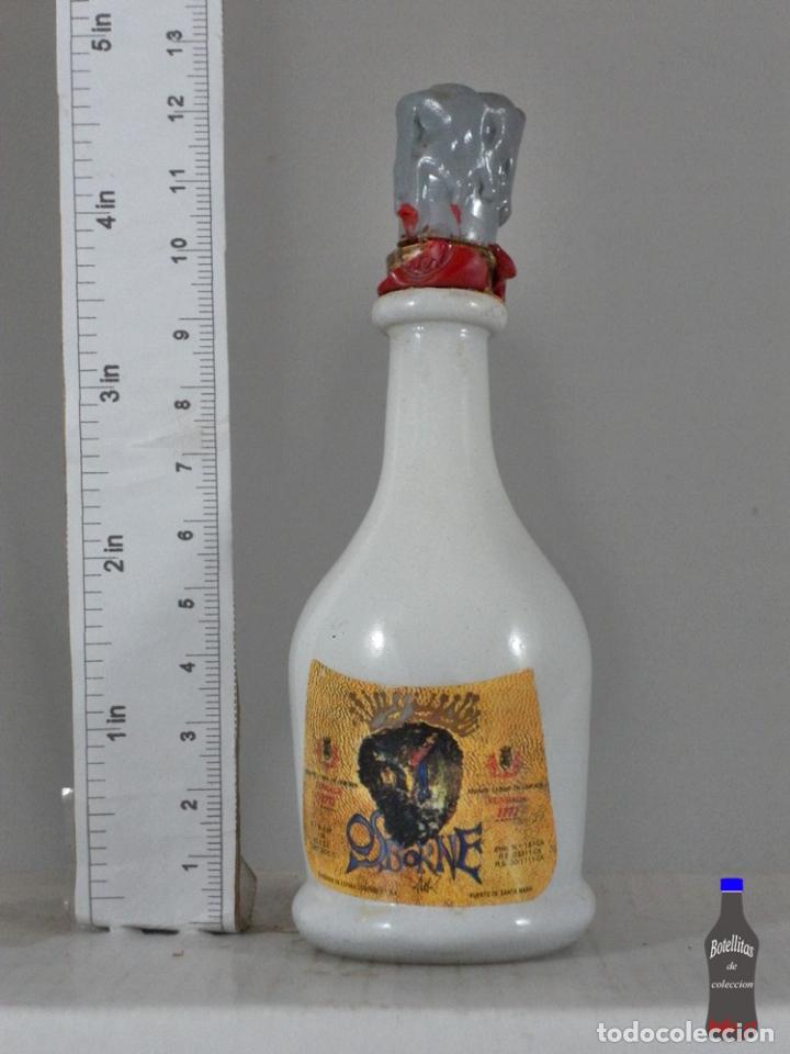 Coleccionismo de vinos y licores: BOTELLITA BOTELLIN BRANDY CONDE DE OSBORNE DALI
