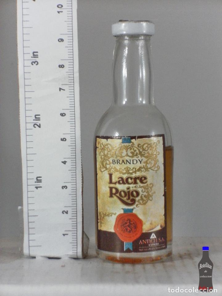 Coleccionismo de vinos y licores: BOTELLITA BOTELLIN BRANDY LACRE ROJO DESTILERIAS ANTICH S.A. BARCELONA