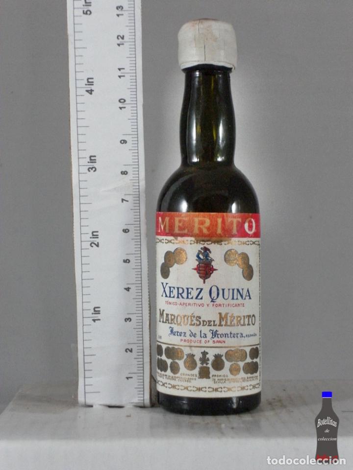 Coleccionismo de vinos y licores: BOTELLITA BOTELLIN MERITO XEREZ QUINA MARQUES DEL MERITO JEREZ DE LA FRONTERA