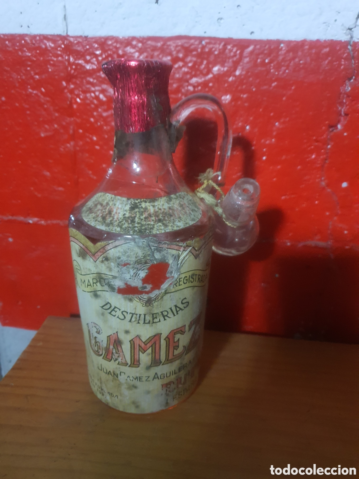 Collection of wines and liquors: botella jarra destileria gamez 1927