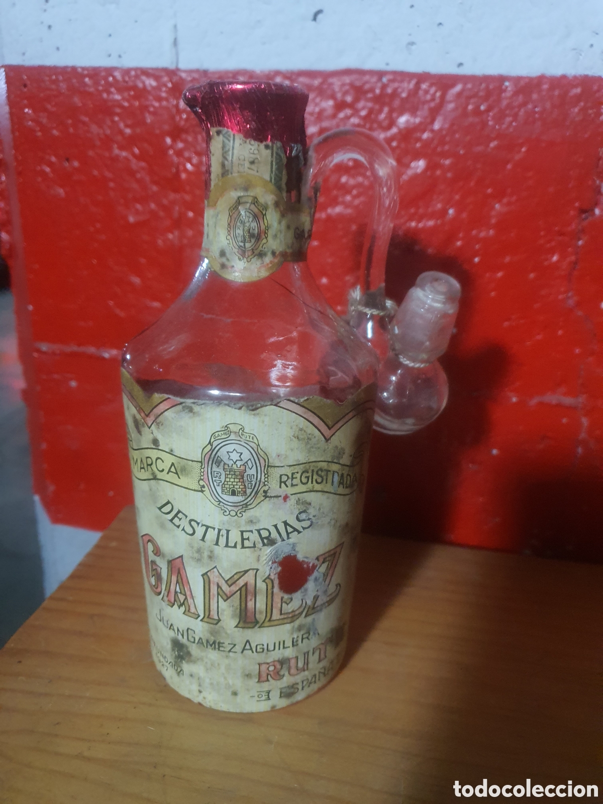 Collection of wines and liquors: botella jarra destileria gamez 1927