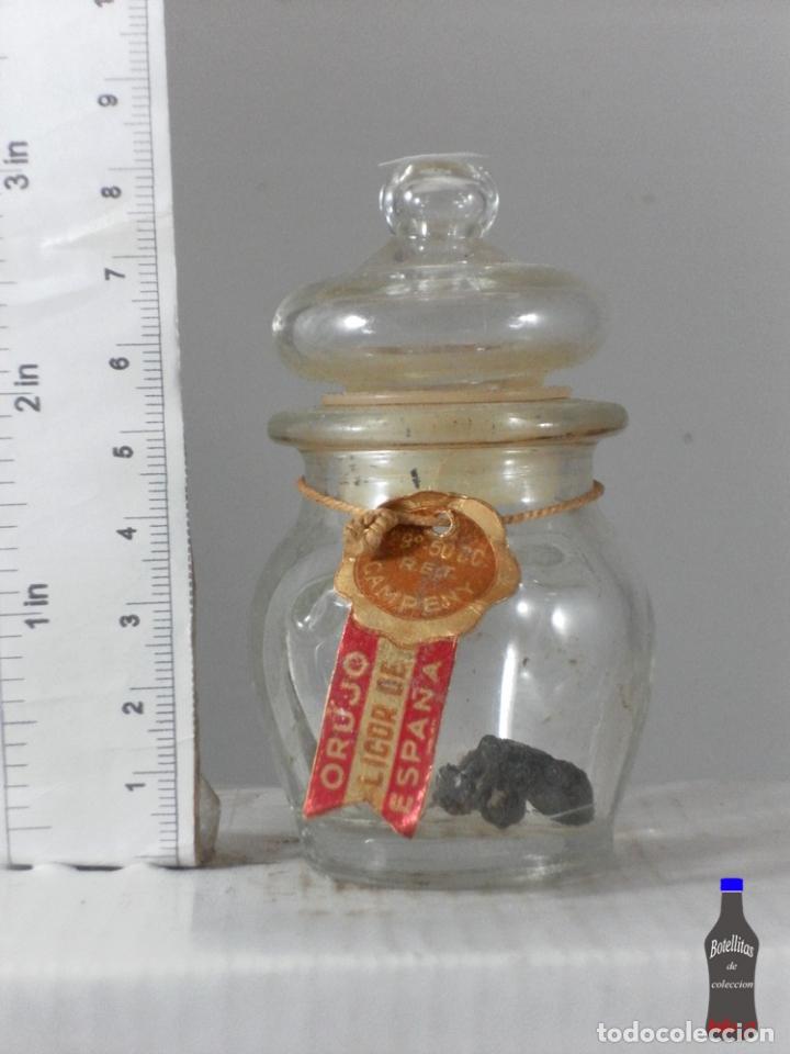 Coleccionismo de vinos y licores: BOTELLITA BOTELLIN LICOR DE ORUJO CAMPENY FIGURITA