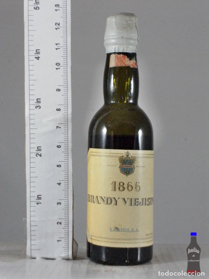 Coleccionismo de vinos y licores: BOTELLITA BOTELLIN BRANDY VIEJISIMO 1866 LARIOS S.A. MALAGA