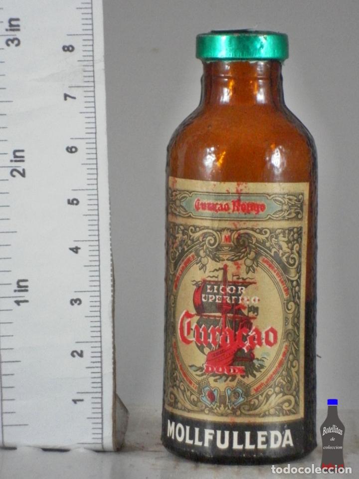 Coleccionismo de vinos y licores: BOTELLITA BOTELLIN LICOR CURACAO DOUX VERDE DESTILERIAS MOLLFULLEDA ARENYS DE MAR BARCELONA
