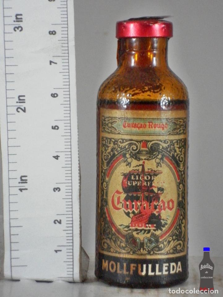 Coleccionismo de vinos y licores: BOTELLITA BOTELLIN LICOR CURACAO DOUX VERDE DESTILERIAS MOLLFULLEDA ARENYS DE MAR BARCELONA