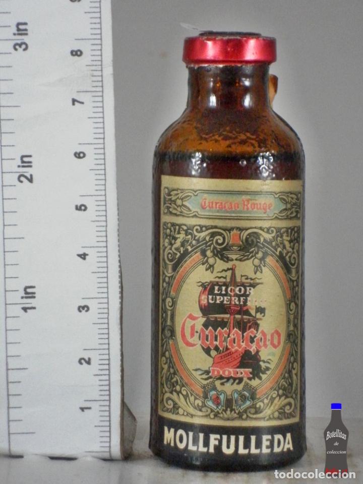 Coleccionismo de vinos y licores: BOTELLITA BOTELLIN LICOR CURACAO DOUX VERDE DESTILERIAS MOLLFULLEDA ARENYS DE MAR BARCELONA