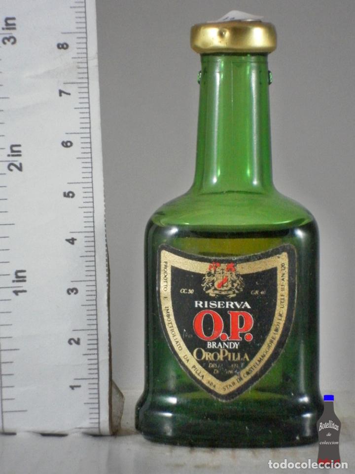 Coleccionismo de vinos y licores: BOTELLITA BOTELLIN OROPILLA RISERVA OP BRANDY CASTELMAGGLOIRE ITALIA