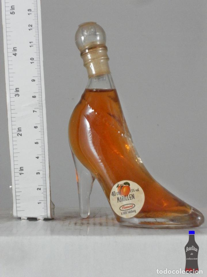 Coleccionismo de vinos y licores: BOTELLITA BOTELLIN LICOR MARILLEN NANNERL SALZBURG ZAPATO