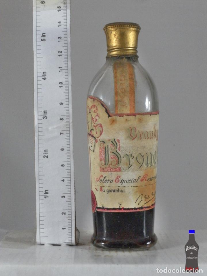 Coleccionismo de vinos y licores: BOTELLITA BOTELLIN BRANDY BRONCE DESTILERIAS VILA MONTA&Ntilde;NA