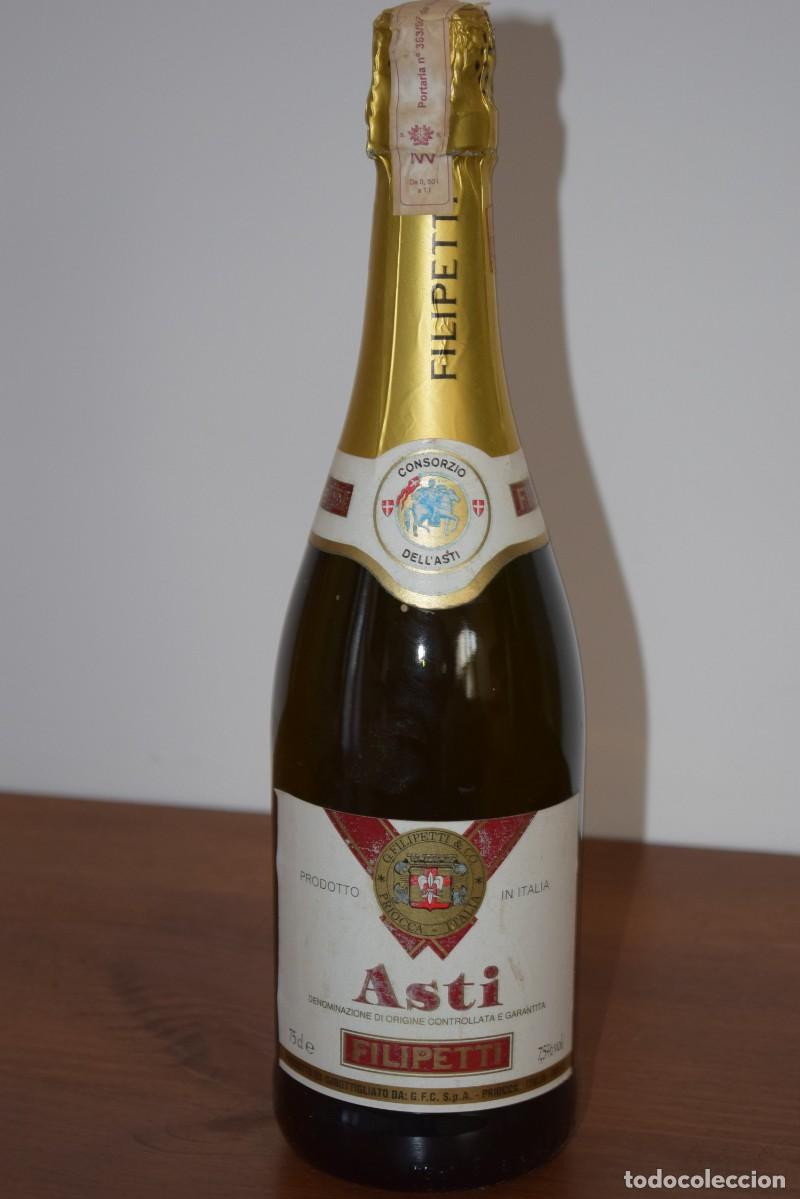 Sammlung von Weinen und Lik&ouml;ren: Botella de vino Espumante-Filipetti- Asti- Denominaci&oacute;n de origen controlada y garantizada Italia