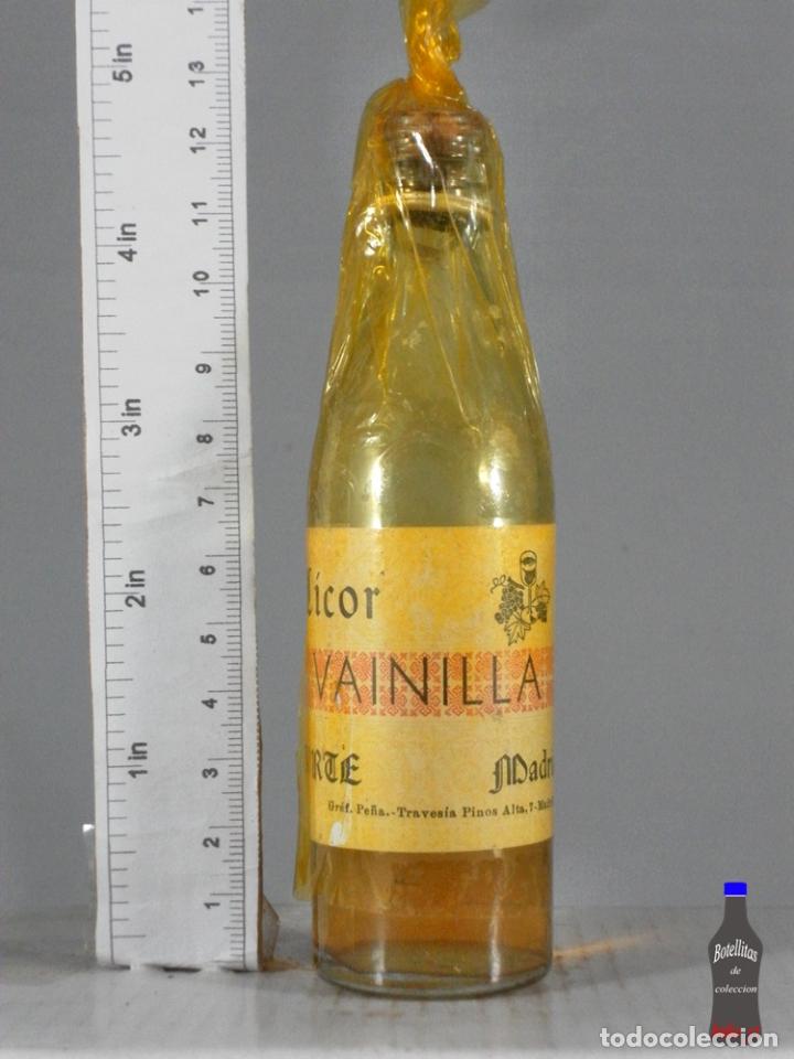 Coleccionismo de vinos y licores: BOTELLITA BOTELLIN LICOR VAINILLA ORTE MADRID