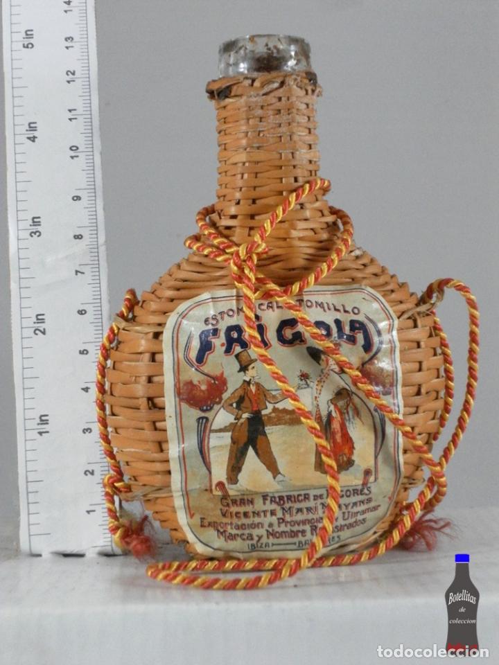 Colecionismo de vinhos e licores: BOTELLITA BOTELLIN FRIGOLA VICENTE MARI MAYANS MIMBRE IBIZA