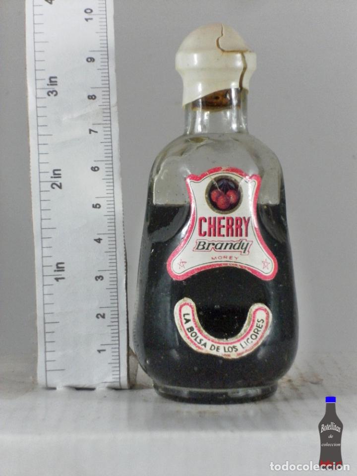 Coleccionismo de vinos y licores: BOTELLITA BOTELLIN CHERRY BRANDY MOREY LA BOLSA DE LOS LICORES