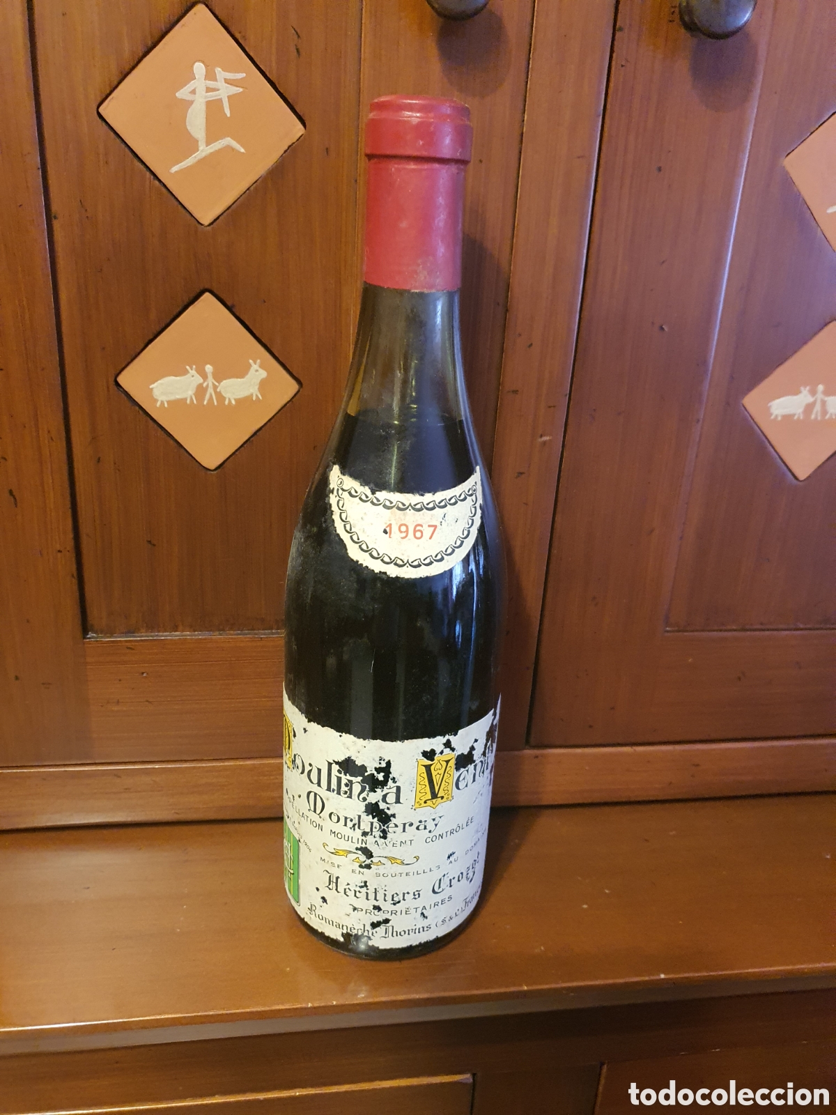Collection of wines and liquors: botella vino moulin a vent morlperay 1967