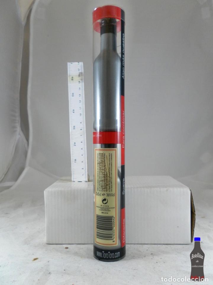 Collection of wines and liquors: BOTELLITA BOTELLIN LOTE DE 2 TORO OSBORNE EN BLISTER TUBO