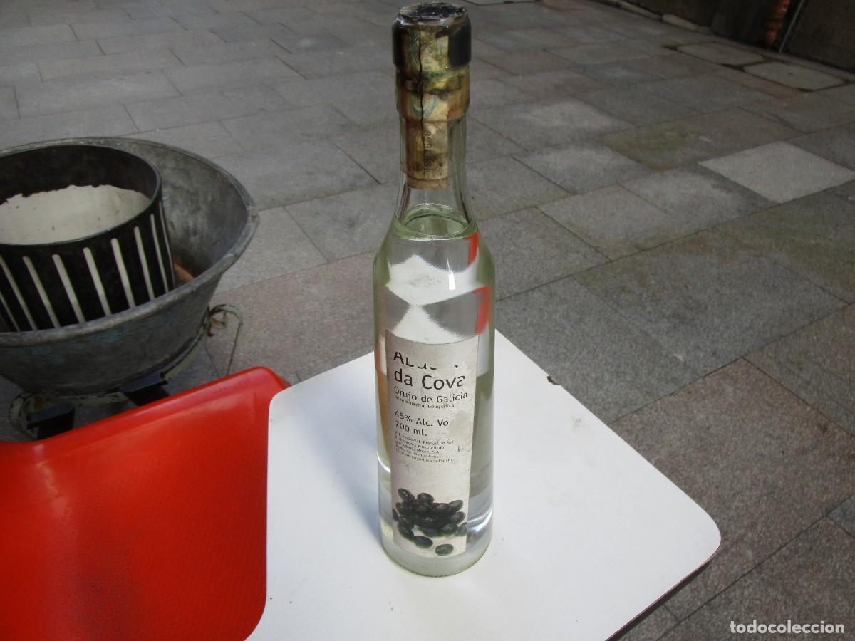 Collection of wines and liquors: BOTELLA ORUJO AGUARDIENTE GALICIA ' ABADIA DA COVA ' ESCAIRON LUGO - 700CC 45&ordm; SIN ABRIR + INFO.