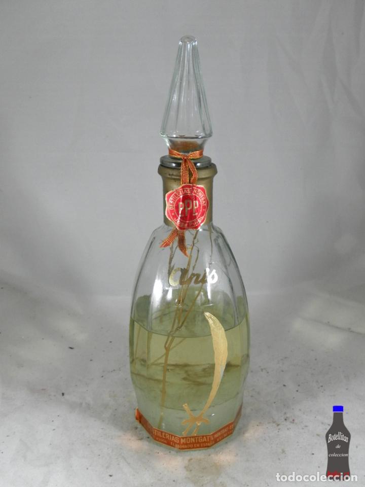 Collectionnisme de vins et liqueurs: BOTELLA ANIS ESCARCHADO DESTILERIAS MONTGAT JOSE PI&Ntilde;OL ORTELLS 75 CL