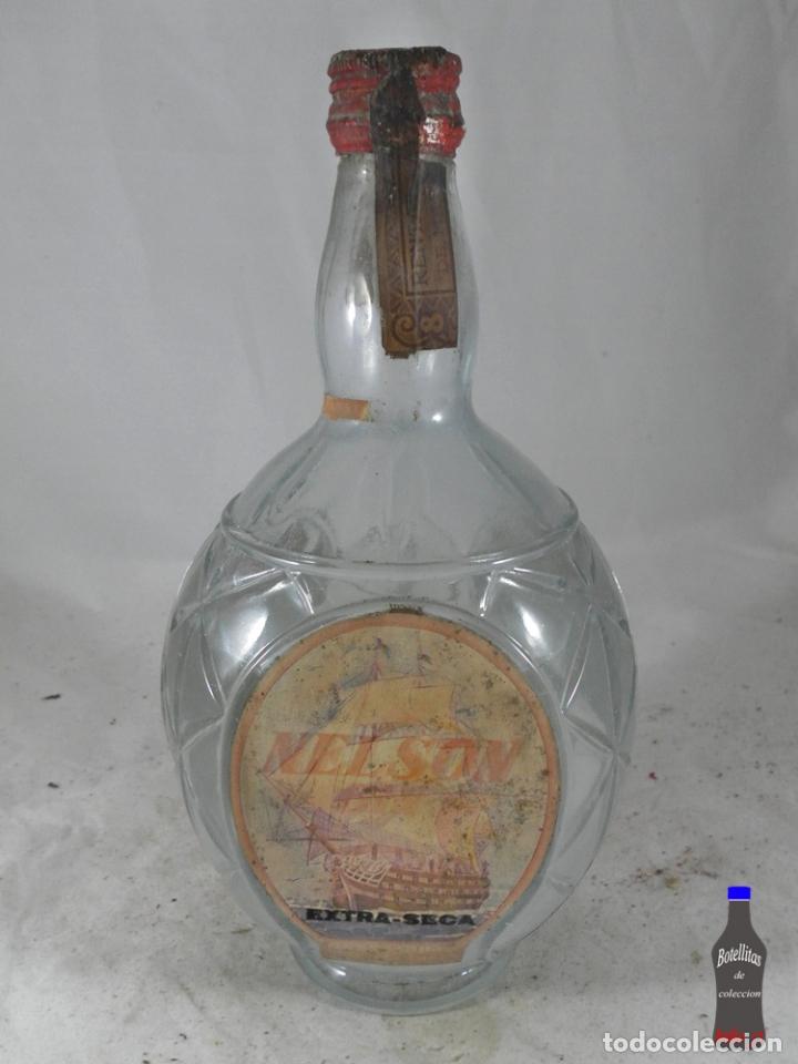 Collection of wines and liquors: BOTELLA GIN NELSON NOGUERAS COMAS 80 CENTIMOS