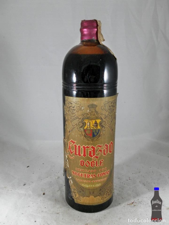 Collectionnisme de vins et liqueurs: BOTELLA CURACAO CURAZAO DOBLE DESTILERIAS NOGUERAS COMAS BARCELONA