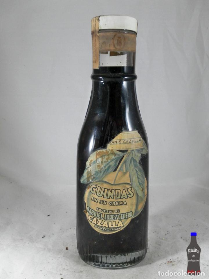 Sammlung von Weinen und Lik&ouml;ren: BOTELLA ANIS CAZALLA IDEAL GUINDAS EN SU CREMA SUCESOR GABRIEL LOPEZ CEPERO CAZALLA SEVILLA ESPA&Ntilde;A