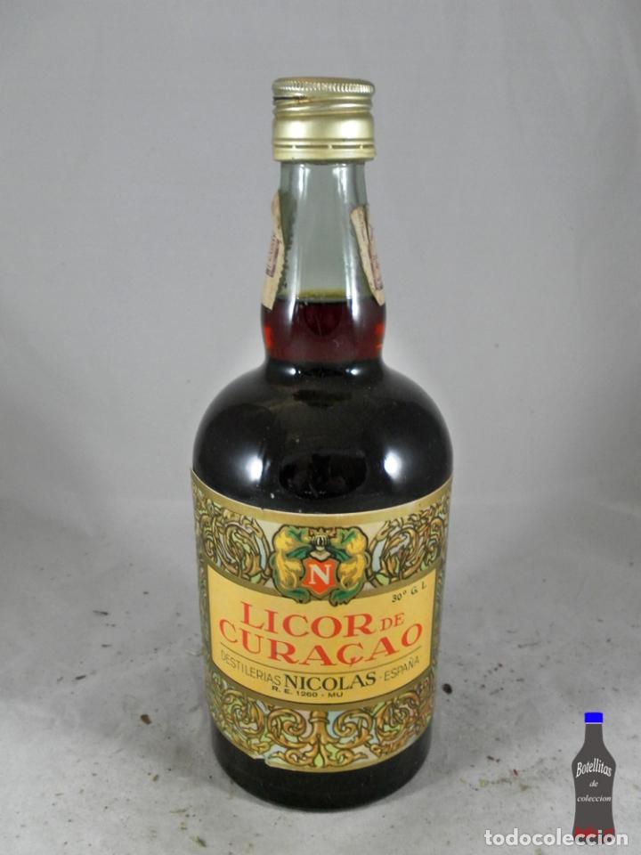 Sammlung von Weinen und Lik&ouml;ren: BOTELLA LICOR DE CURACAO DESTILERIAS NICOLAS NONDUERMAS MURCIA